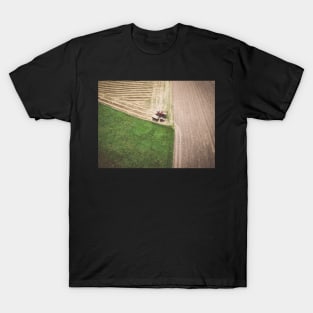 Aerial view of combine-harvester and tractor working in the field T-Shirt